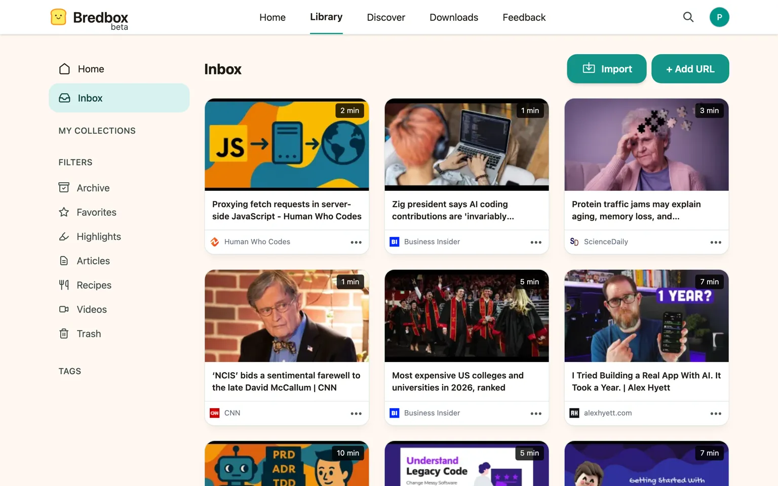 The Bredbox library, showing saved articles as a grid of cards with a sidebar for collections, filters, and tags